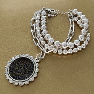 Upcycled Bracelet with Authentic designer materials